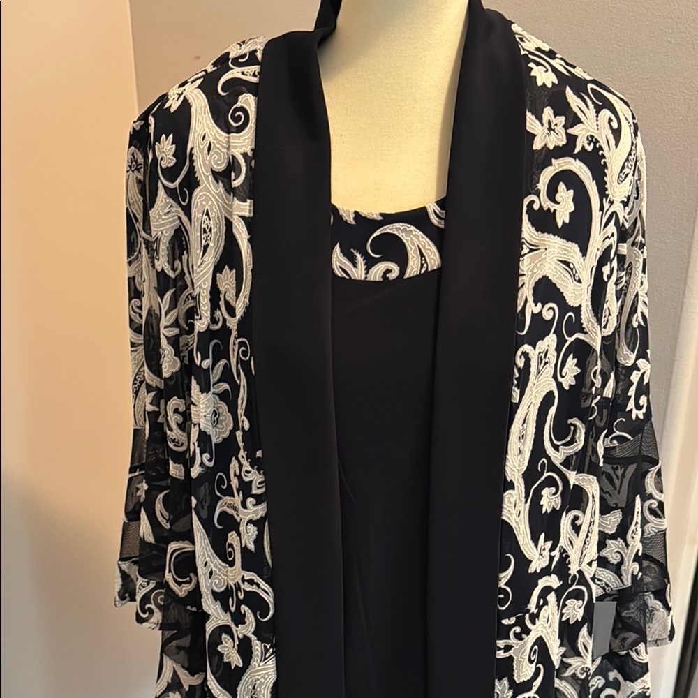 Women’s two piece pant suit.